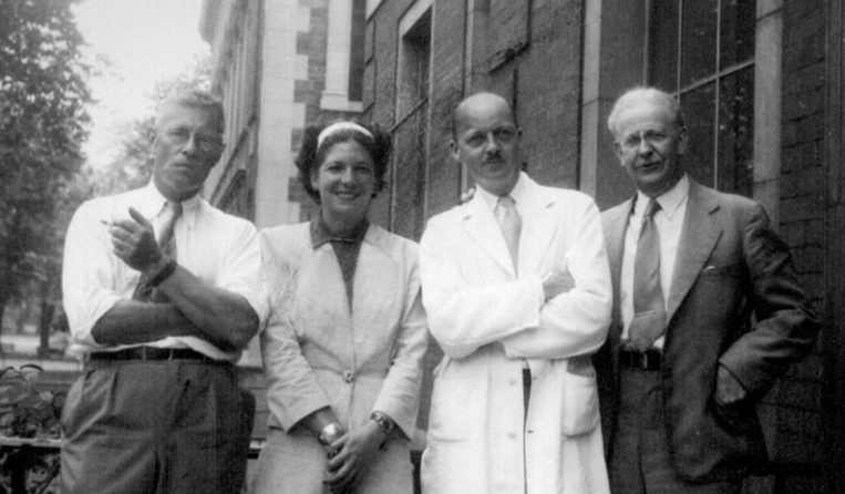 From left to right, Dr. Donald T. Fraser and Dr. Frieda H. Fraser, with R.C. Parker and R.D. Defries at the School of Hygiene, c. 1940s. Image: Archives, Sanofi Pasteur Canada (formerly Connaught Laboratories).From left to right, Dr. Donald T. Fraser and Dr. Frieda H. Fraser, with R.C. Parker and R.D. Defries at the School of Hygiene, c. 1940s